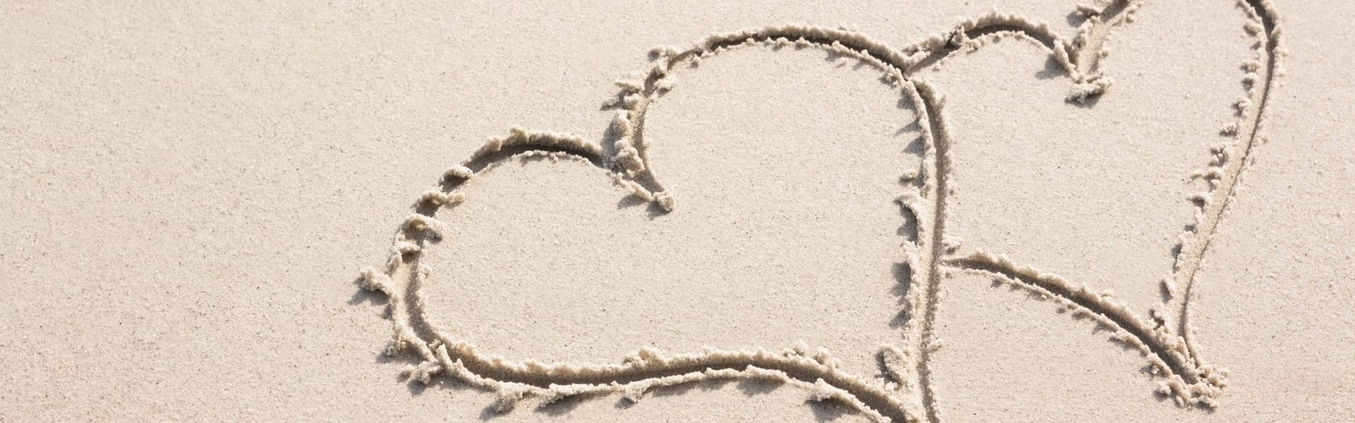 two hearts in sand decoration